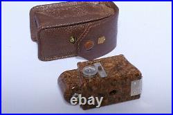 Coronet Midget 16mm compact bakelite collectible camera. Brown color with case