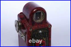 Coronet Midget 16mm compact bakelite collectible camera. Red color. Circa 1935