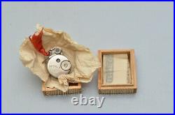 Subminiature camera with wooden box and instruction