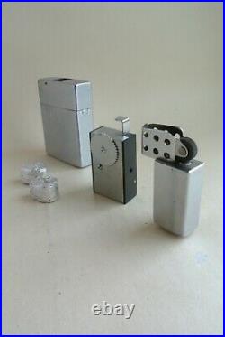Suzuki Cameralite lighter subminiature camera, with two unused film rolls, exc