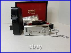 Vintage Minolta 16-MG Camera in Case with Accessories and Manual Not Tested