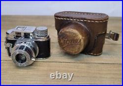 Vintage Tone subminiature camera. C1948-50. 16mm film, 10x14mm exposures. Withcase